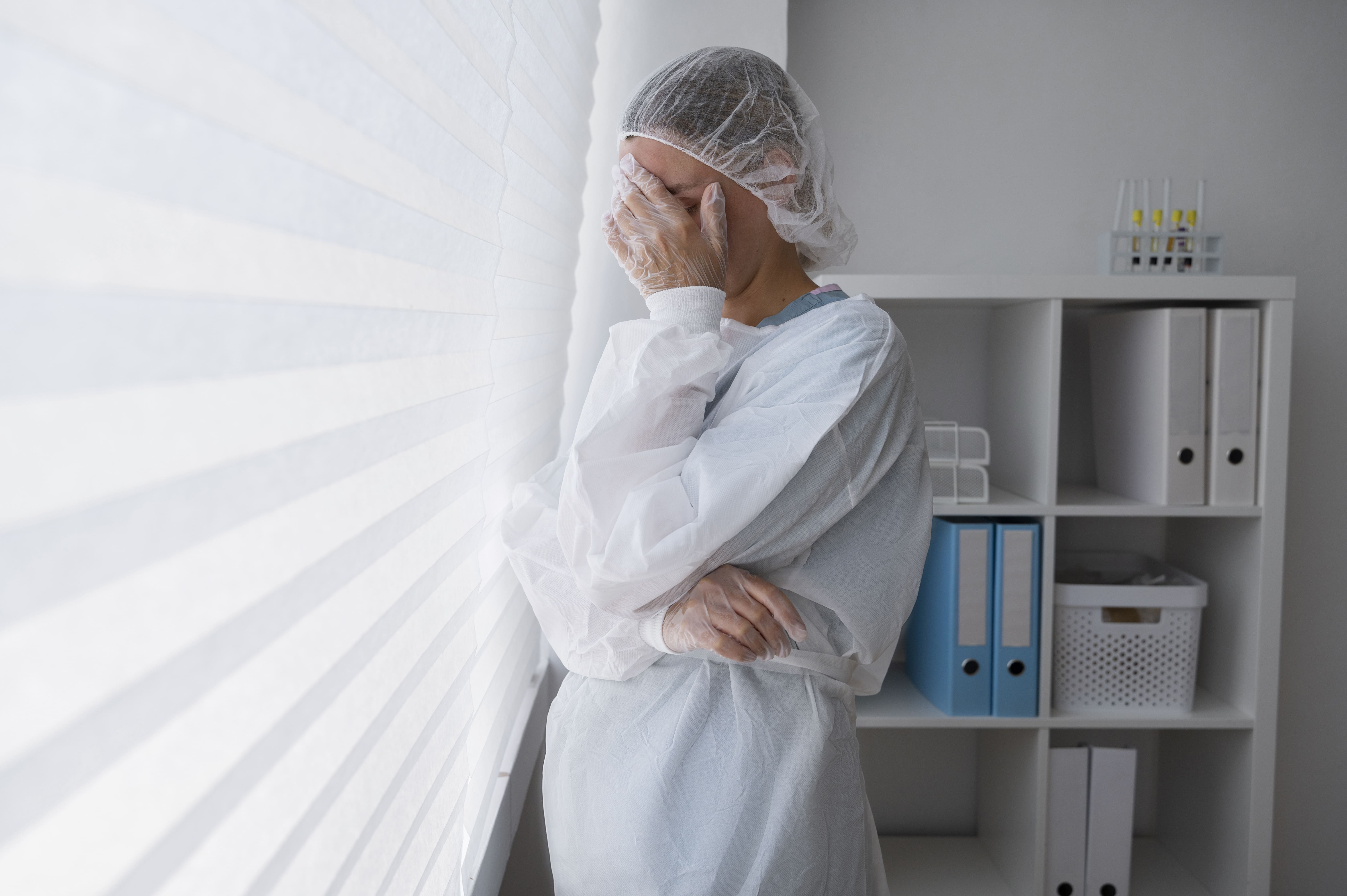 side-view-sad-doctor-wearing-medical-gown (1).jpg
